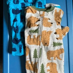 Two fleece Carter’s animal footie jammies